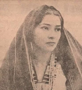 A possible photo of Paula Angel, with a shawl draped over her.